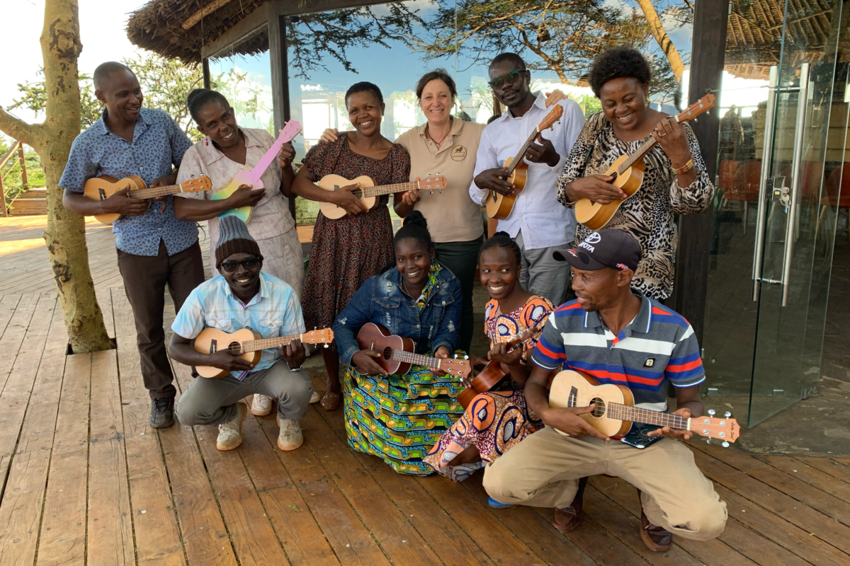 A group of ukulele players gathered together in Kenya